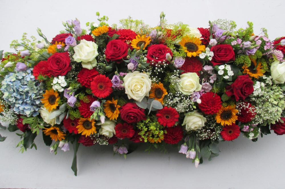 Gaertnerei Vietzen Ulm Trauerfloristik Sargschmuck Blumenmischung